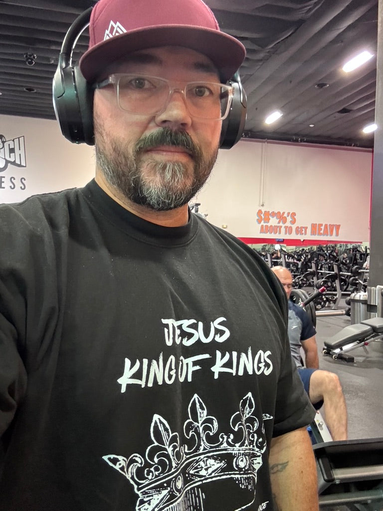 man looking at camera at a gym