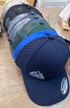 Blue cap with a logo on a wooden surface